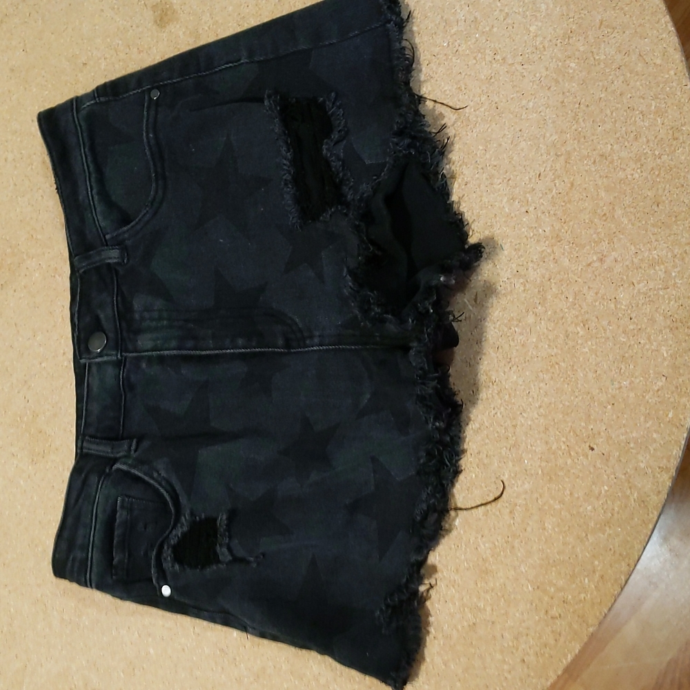 Black star jean shorts